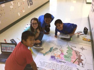 Photo of students creating giant floor map