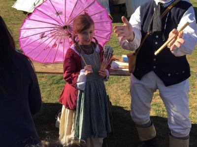 photo of students learning about colonial garb