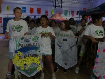 photo of students with banner