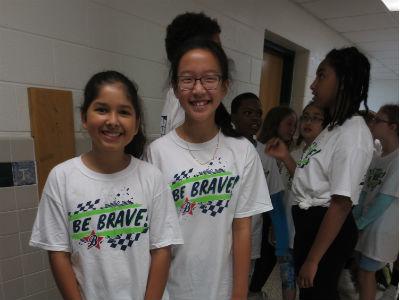 photo of girls in matching shirts for fun run